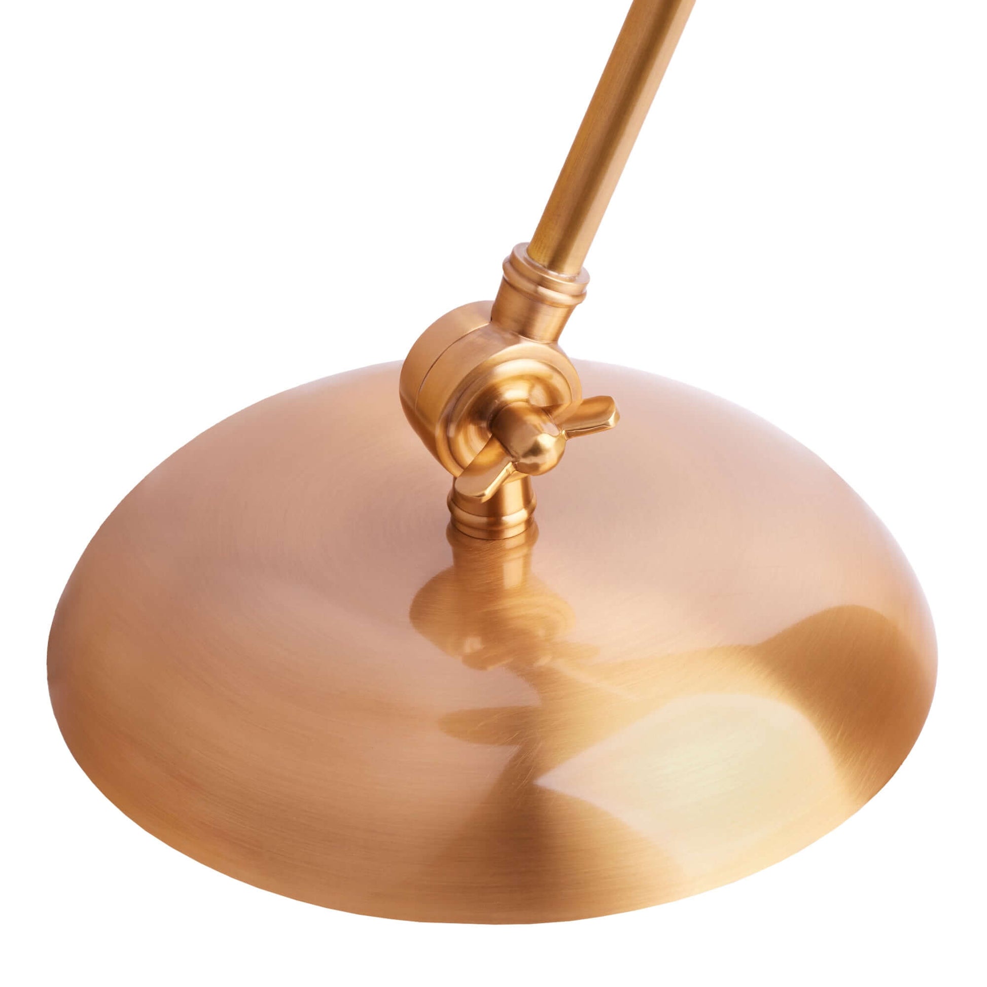 DET,alt:Close-up of a brushed brass base of a lamp with an angled support rod and an adjustable joint.